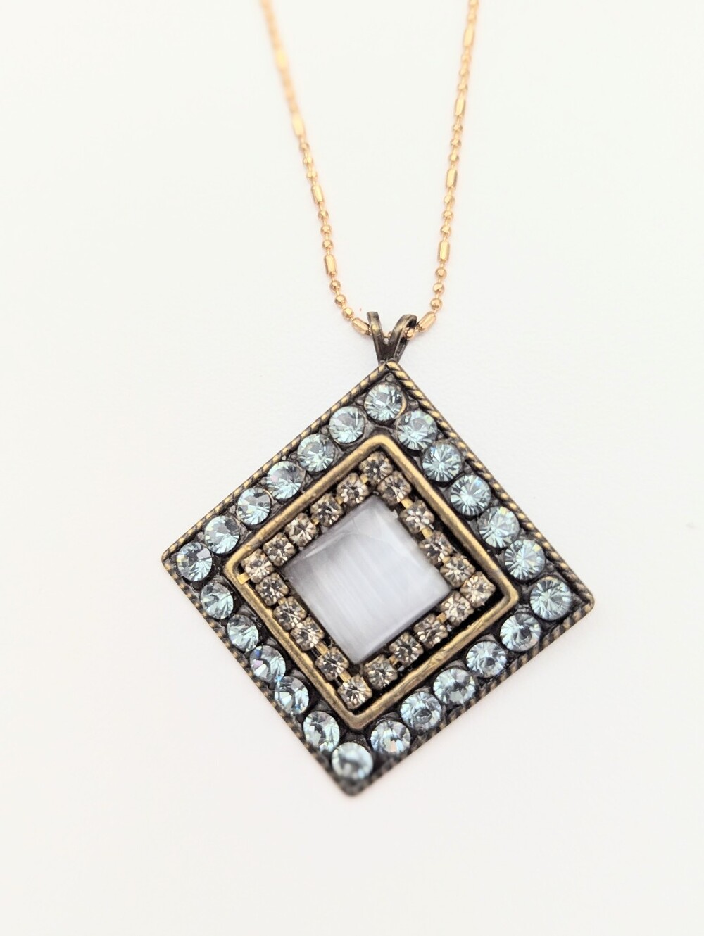 Gold-Tone Square Pendant Necklace w/Blue & Gold Stones Surrounding Centre Stone